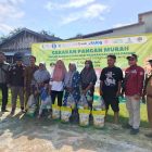 Masyarakat bersama petugas usai pelaksanaan Gerakan Pangan Murah jelang Idul Adha di Desa Sungai Itik, Kecamatan Sadu, Senin (25/5/2026).